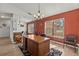 Bright home office features built-in desk and large window at 13101 Delbarton St, Spring Hill, FL 34609