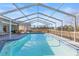Refreshing screened pool ready for relaxation at 13101 Delbarton St, Spring Hill, FL 34609
