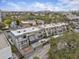 Aerial view of townhouses with parking and water views at 162 E Davis Blvd, Tampa, FL 33606