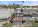 Aerial view of a three-story townhouse with private garage and patio at 162 E Davis Blvd, Tampa, FL 33606