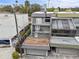 Aerial view showing a three-story townhouse with a private garage and patio at 162 E Davis Blvd, Tampa, FL 33606