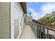 Spacious balcony with tile flooring and sliding glass doors at 162 E Davis Blvd, Tampa, FL 33606