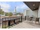 Private balcony with seating area and grill, offering city views at 162 E Davis Blvd, Tampa, FL 33606