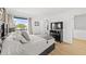 Comfortable bedroom with a queen-size bed and a view at 162 E Davis Blvd, Tampa, FL 33606