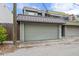 Attached garage with a light gray door at 162 E Davis Blvd, Tampa, FL 33606