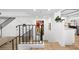Modern staircase with metal railing leading to upper level at 162 E Davis Blvd, Tampa, FL 33606