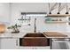 Copper sink and butcher block countertop highlight this kitchen at 162 E Davis Blvd, Tampa, FL 33606