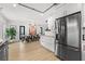 Modern kitchen with stainless steel appliances and white shaker cabinets at 162 E Davis Blvd, Tampa, FL 33606