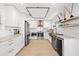 Modern kitchen boasts stainless steel appliances and copper sink at 162 E Davis Blvd, Tampa, FL 33606