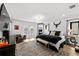 Bright and airy main bedroom featuring a king-size bed and stylish decor at 162 E Davis Blvd, Tampa, FL 33606