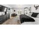 Spacious main bedroom with a king-size bed, and access to a private balcony at 162 E Davis Blvd, Tampa, FL 33606