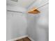 Walk-in closet with wire shelving and wooden hangers at 1654 50Th N Ave, St Petersburg, FL 33714
