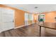 Charming dining room with hardwood floors and a view to the kitchen at 1654 50Th N Ave, St Petersburg, FL 33714