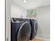 Laundry room with modern washer and dryer set at 1654 50Th N Ave, St Petersburg, FL 33714