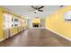 Bright living room featuring hardwood floors and a fireplace at 1654 50Th N Ave, St Petersburg, FL 33714
