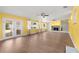 Spacious living room with hardwood floors and a fireplace at 1654 50Th N Ave, St Petersburg, FL 33714