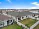 Aerial view of houses with backyard and fence at 17019 Avon Dive Ln, Wimauma, FL 33598