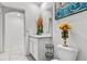 Bathroom with white vanity and decorative accents at 17019 Avon Dive Ln, Wimauma, FL 33598