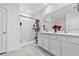 Clean bathroom with shower and double vanity at 17019 Avon Dive Ln, Wimauma, FL 33598