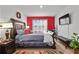 Spacious bedroom with large bed and flat screen TV at 17019 Avon Dive Ln, Wimauma, FL 33598