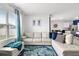 Open living room showcasing a sectional sofa and stylish decor at 17019 Avon Dive Ln, Wimauma, FL 33598