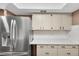 Stainless steel appliances and white countertops in this kitchen at 19029 Us Highway 19 N # 26-304, Clearwater, FL 33764