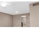 Open living room with neutral walls and carpeting at 19029 Us Highway 19 N # 26-304, Clearwater, FL 33764