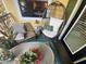 Relaxing balcony with outdoor furniture and potted plants at 2010 E Palm Ave # 15305, Tampa, FL 33605