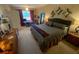 Spacious bedroom with king-size bed and a convenient workspace at 2010 E Palm Ave # 15305, Tampa, FL 33605
