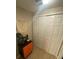 Hall closet with double doors and shelving at 2010 E Palm Ave # 15305, Tampa, FL 33605