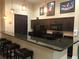 Community kitchen with granite countertops and modern appliances at 2010 E Palm Ave # 15305, Tampa, FL 33605