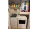 Laundry room with washer, dryer, and extra storage at 2010 E Palm Ave # 15305, Tampa, FL 33605