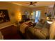 Spacious living room with sectional sofa and access to balcony at 2010 E Palm Ave # 15305, Tampa, FL 33605