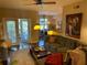 Open living room with sectional sofa, balcony access, and modern decor at 2010 E Palm Ave # 15305, Tampa, FL 33605