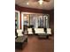 Relaxing patio with comfortable seating and views of community amenities at 2010 E Palm Ave # 15305, Tampa, FL 33605
