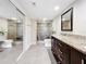 Spa-like bathroom with granite countertops and walk-in shower at 225 Country Club Dr # 1611, Largo, FL 33771