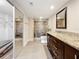 Elegant bathroom with granite countertops and a walk-in shower at 225 Country Club Dr # 1611, Largo, FL 33771