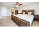 Bright bedroom featuring a king-size bed and ensuite bathroom at 225 Country Club Dr # 1611, Largo, FL 33771
