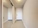 Bright condo entryway with mirrored closet at 225 Country Club Dr # 1611, Largo, FL 33771