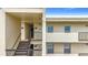Condo building exterior showcasing stairs and building features at 225 Country Club Dr # 1611, Largo, FL 33771