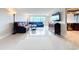 Spacious living room with sectional sofa and open floor plan at 225 Country Club Dr # 1611, Largo, FL 33771