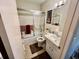 Bathroom features a shower/tub combo and updated vanity at 2461 Rhodesian Dr # 51, Clearwater, FL 33763