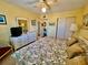 Bright bedroom featuring a king-size bed and ample closet space at 2461 Rhodesian Dr # 51, Clearwater, FL 33763