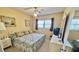 Spacious bedroom with king-size bed and large windows at 2461 Rhodesian Dr # 51, Clearwater, FL 33763
