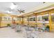 Community common area with tables and chairs at 2461 Rhodesian Dr # 51, Clearwater, FL 33763