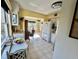 Kitchen with white cabinets and breakfast nook at 2461 Rhodesian Dr # 51, Clearwater, FL 33763