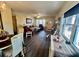 Living room with sofa, chairs, and dining area at 2461 Rhodesian Dr # 51, Clearwater, FL 33763