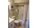 Clean bathroom with a bathtub, toilet, and vanity with a large mirror at 2465 Northside Dr # 1203, Clearwater, FL 33761