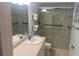 Clean bathroom with walk-in shower and updated vanity at 2465 Northside Dr # 1203, Clearwater, FL 33761