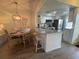 Kitchen with breakfast bar, stainless steel appliances, and a granite countertop at 2465 Northside Dr # 1203, Clearwater, FL 33761